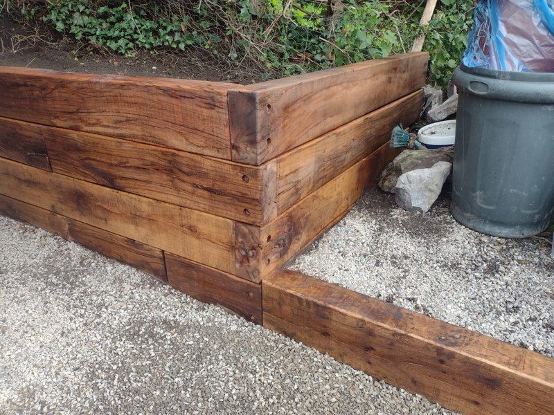 oak sleepers holding up a raised bed