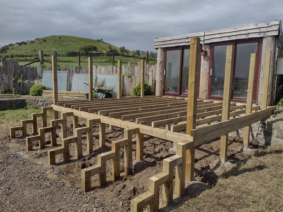 the wooden foundations for a decking