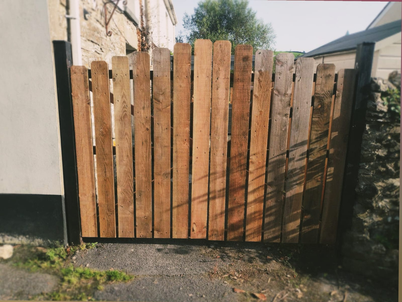 a big beautiful wooden gate