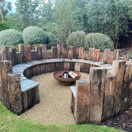 circular seating around a firepit, made from wood